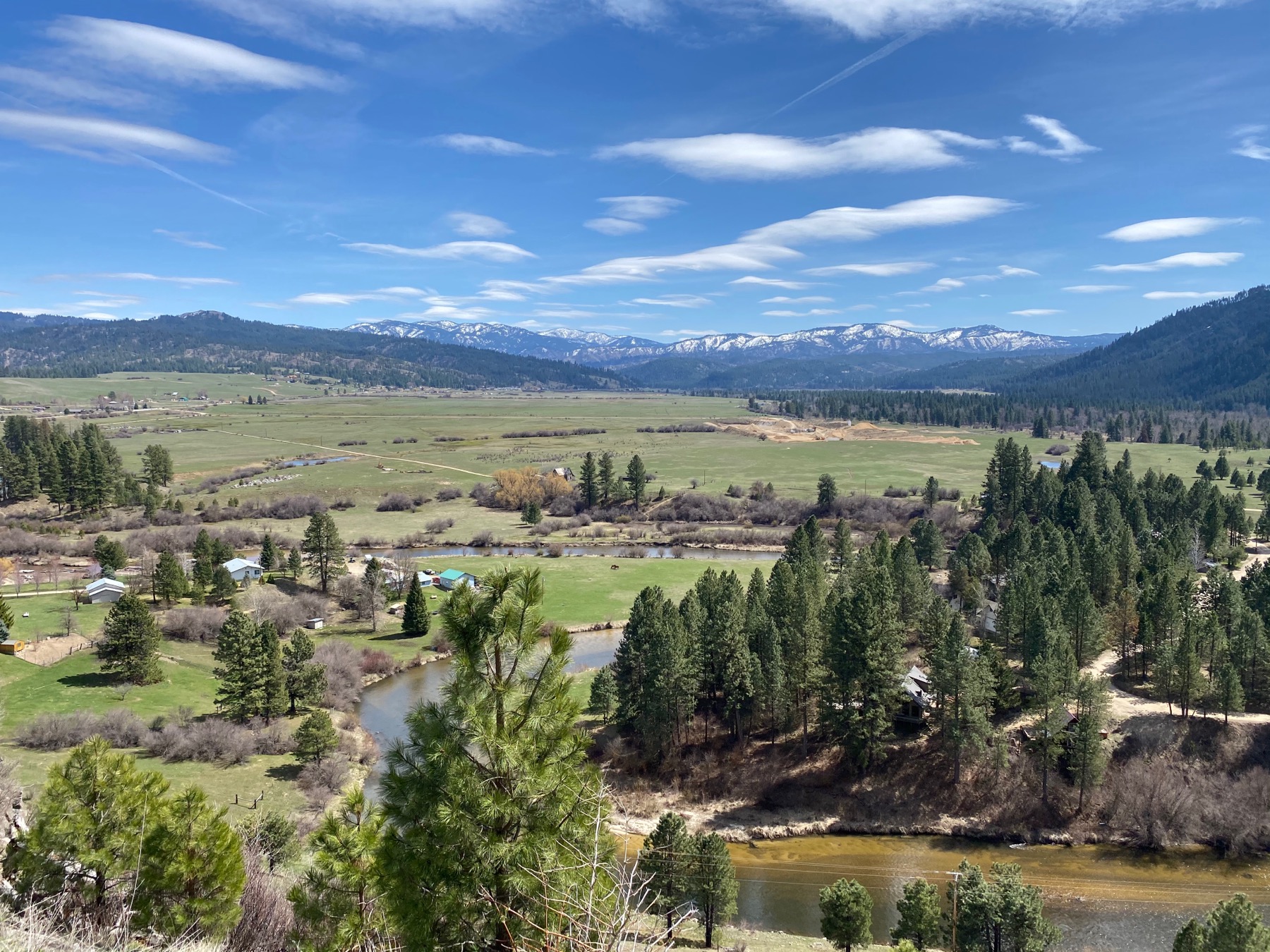 Aerial view of the valley, river, and surrounding homes